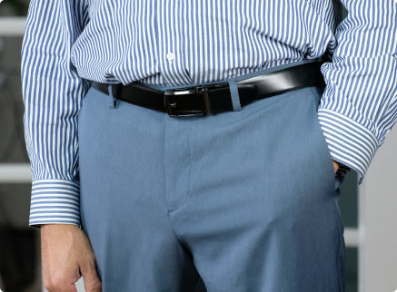 Man in stylish blue business attire with a black leather SureFIt Belt.